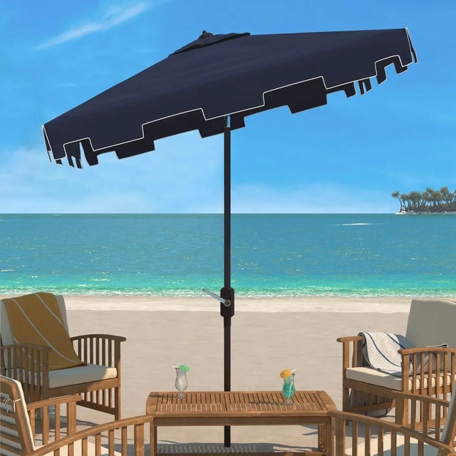 A classic market umbrella gets a chic makeover in forever fashionable navy and white with a stylish valance for extra sun...
