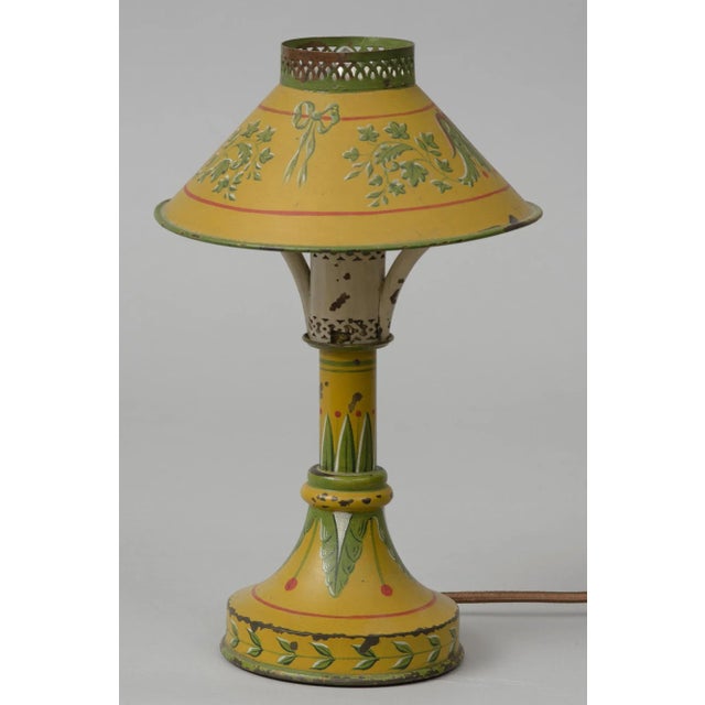 French small tole night light decorated in mustard yellow with green acanthus leaves, ivy, bows and red line borders. This...
