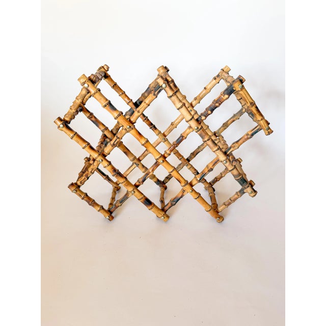 Beautiful Hollywood Regency Chinoiserie burnt bamboo collapsible wine rack. Bamboo is light brown in color with darker...