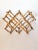 Beautiful Hollywood Regency Chinoiserie burnt bamboo collapsible wine rack. Bamboo is light brown in color with darker...