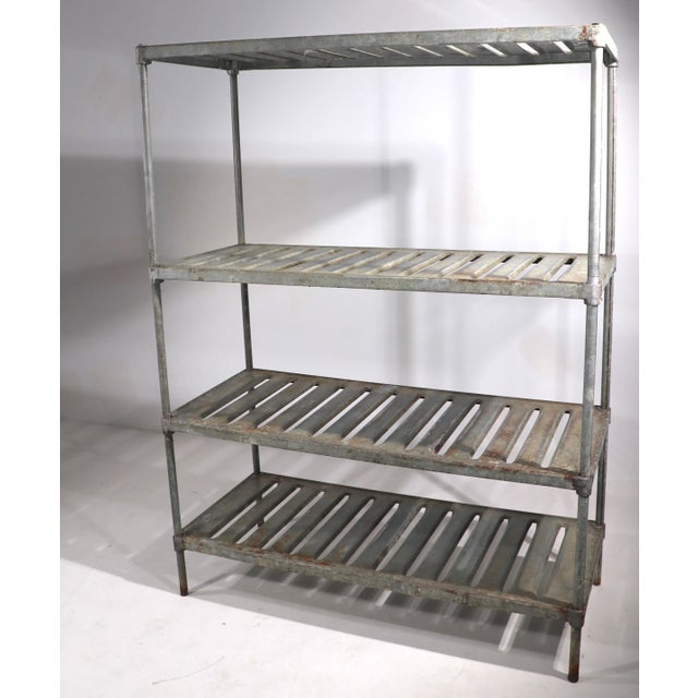 We have a total of 1 of these industrial shelves in this width ( 46" ) and 2 more which are slightly smaller ( 36" W )...