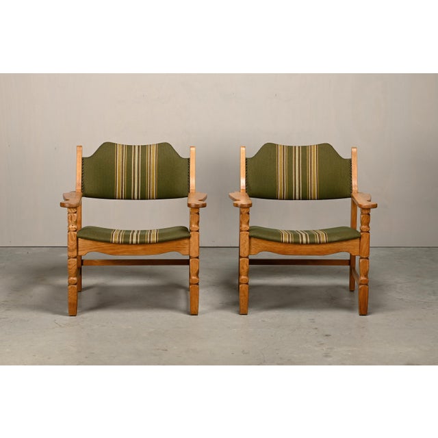 Pair Henning Kjærnulf Razorblade armchairs for Farsø Stolefabrik, Denmark, 1960s. Solid oak frame with seat and backrest...