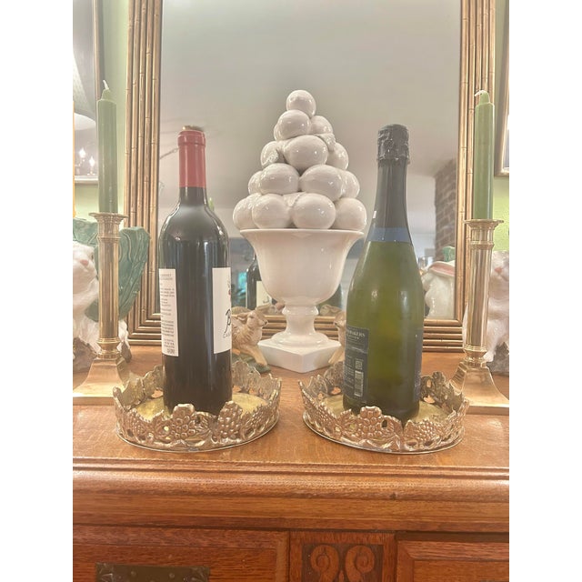 Perfect for the holidays…this pair of cast brass wine /decanter coasters will add a bit of glamour to a bar cart, buffet...