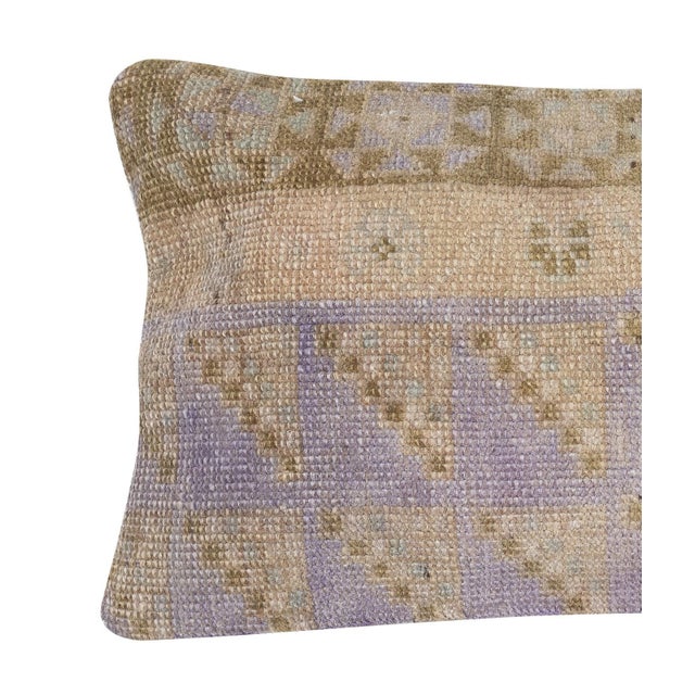 Add a touch of history and warmth to your space with this vintage handmade Turkish wool rug cushion cover. Crafted from...