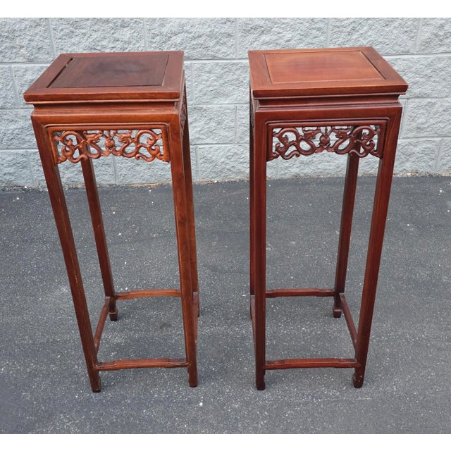 A Stunning slender Pair of mid 20th century Chinese Hongmu Stands Pedestals / Plant Stands. Measures 12.5" in width, 12.5"...