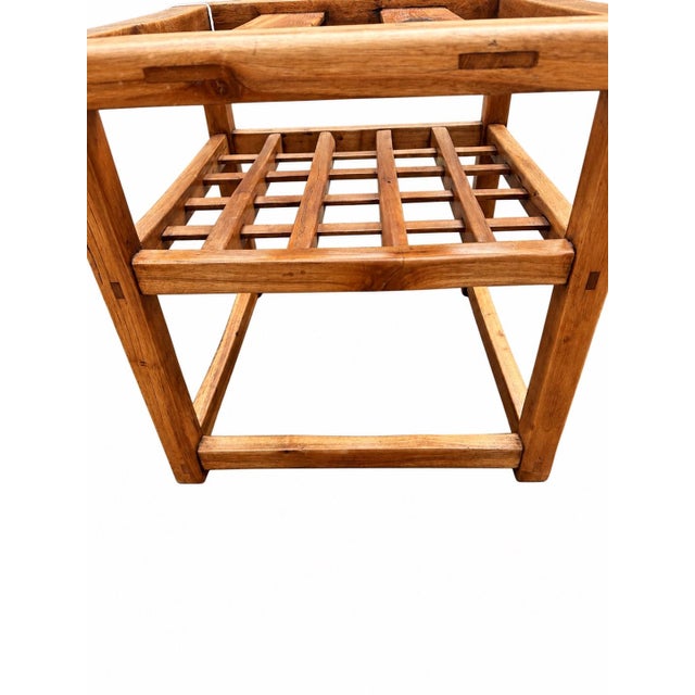 Warm wood tones and expressive grain lend quiet presence to this vintage Japanese kotatsu table frame, identified by its...