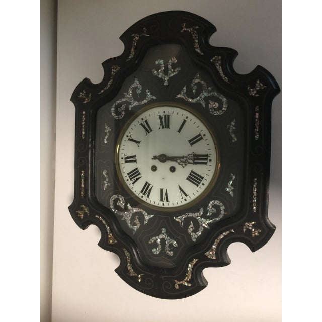 Circa 1860 Napoleon III Wind Up Wall Clock. Mother of Pearl inlay, key and pendulum present.