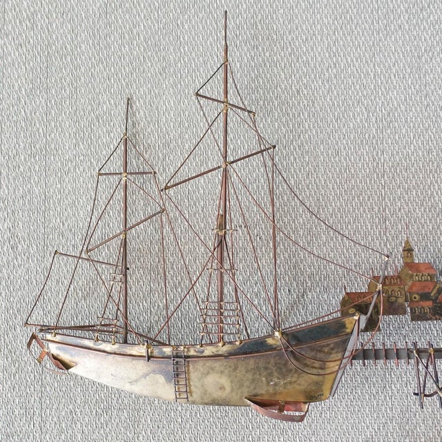 This wall sculpture was designed by Curtis Jere and produced for Artisan House, in USA, during the 1970's. It is made of...