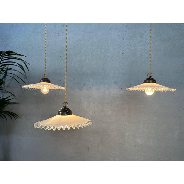 A set of 5 opaline collar lamps. Mouth-blown, making each shade unique. Ideal above the kitchen counter or in a bistro....