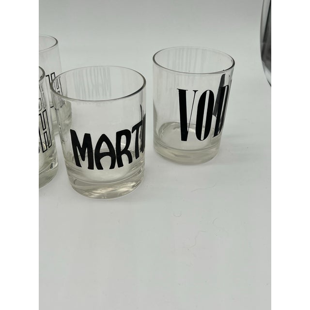 Great set of six mid-century glasses. Clear glass with large black letters - Scotch, Gin, Vodka and Martini.