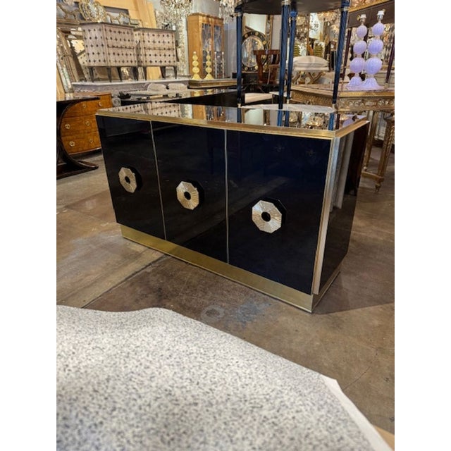 Fine modern Italian designer black glass and brass buffet. Circa 2000. Perfect for today's transitional designs! 60w x 19d...