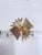Designed during Marcel Boucher’s celebrated early 1950s sculptural metalwork period, this vintage brooch (design 379R)...