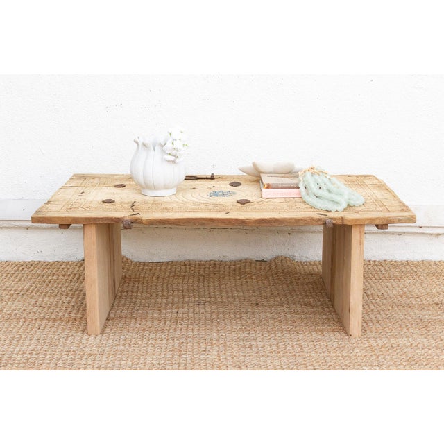 This stunning coffee table began its life as a solid wooden door in a historic merchant's home. We have preserved its...