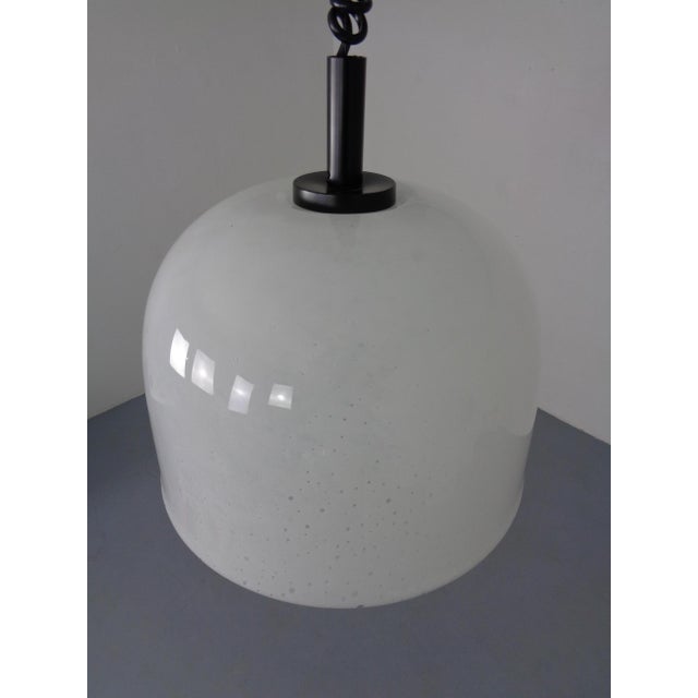 Putzler ceiling lamp made of thick glass from the 1960s. I have official proof of authenticity such as vintage catalogs,...