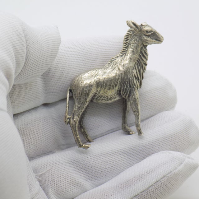 A finely detailed and characterful piece, this vintage Italian miniature depicts a standing goat rendered in solid silver...
