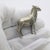 A finely detailed and characterful piece, this vintage Italian miniature depicts a standing goat rendered in solid silver...