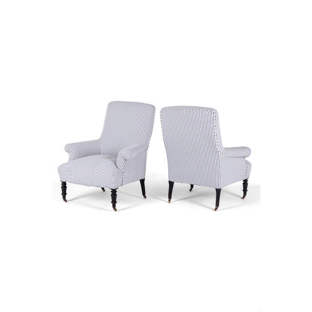 A wonderful pair of 19th century french napoleon iii square back armchair with a low back and a wide generous seat. The...