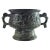 Evocative of ancient ceremonial artistry, this cast bronze Gui vessel draws from early Zhou dynasty ritual forms. The...