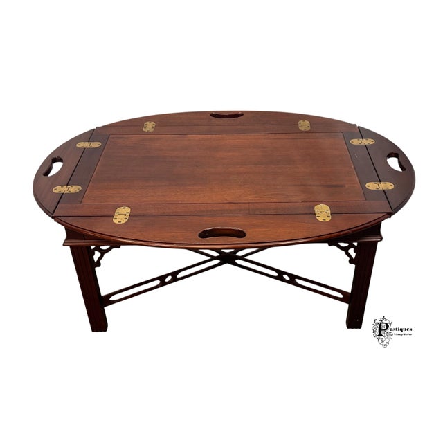 Vintage Chippendale Style Butler’s Coffee / Tray Table featuring High Quality Mahogany Construction, Folding Sides with...