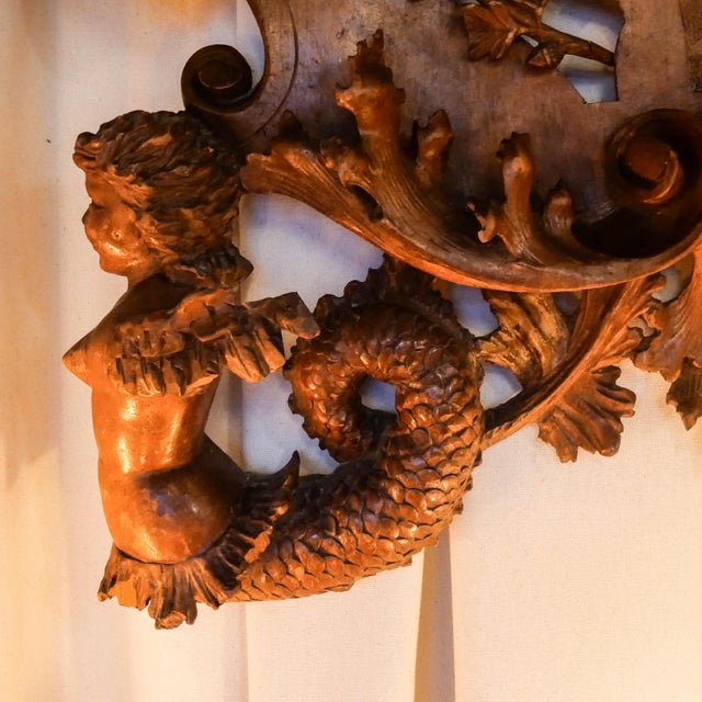 A splendid 19th-century Italian mirror, crafted from carved walnut, testifies to the influence of the Italian Renaissance...