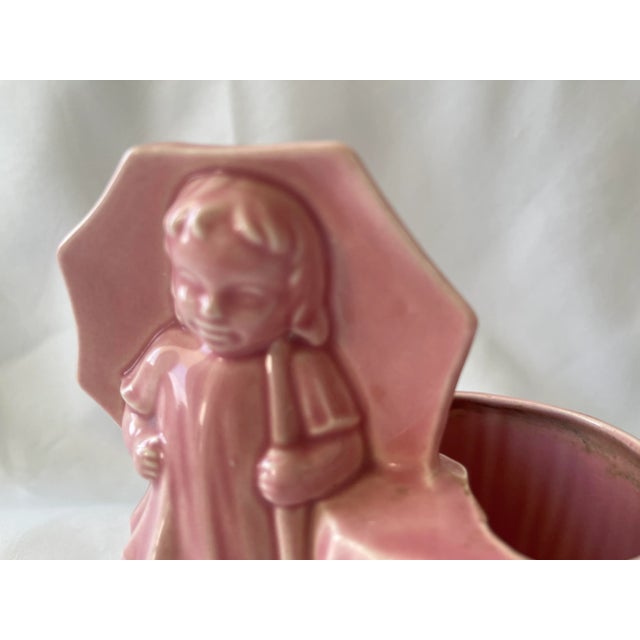 This Vintage Pink Ceramic Umbrella Girl is the perfect little plant holder that you’ll proudly display on and desk or...