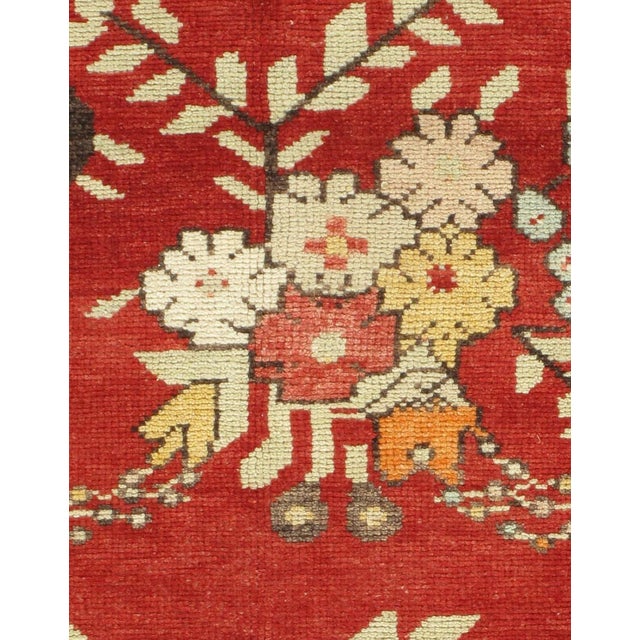 Character, tradition, and artistry come together in this stunning hand-knotted vintage Turkish Oushak rug, featuring...