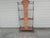 Wicker, rattan, bronzed metal, a good combination for so many things to display. Great for books, plants, a dry bar and so...