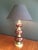 This beautiful table lamp is made of 3 nice red glass balls and brass elements. This is a nice work by a French designer,...