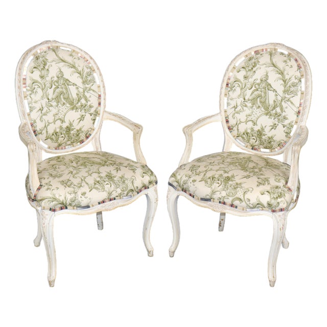 Pair of Distressed French Louis XV Style Painted Arm Chairs W/ Toile Upholstery For Sale