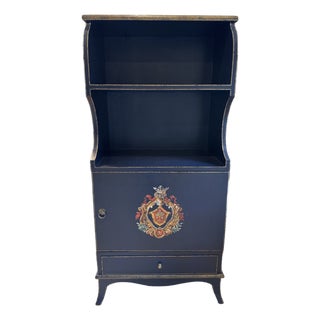 Hand-Painted Vintage Cabinet With Open Shelving – Navy Finish, Distressed Edges, Coat-of-Arms Motif For Sale
