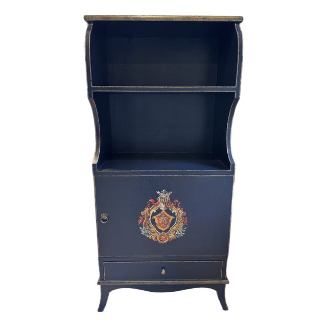 Hand-Painted Vintage Cabinet With Open Shelving – Navy Finish, Distressed Edges, Coat-of-Arms Motif For Sale