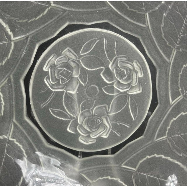 Set of nine vintage Bagley rose and leaf frosted glass plates, each featuring a central trio of stylized roses surrounded...