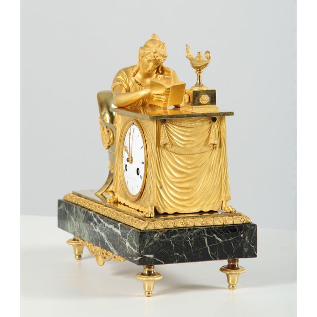 Pendule la lieuse - the reader paris bronze, marble, enamel empire around 1813 dimensions: h x w x d: 30 x 30 x 15 cm :...