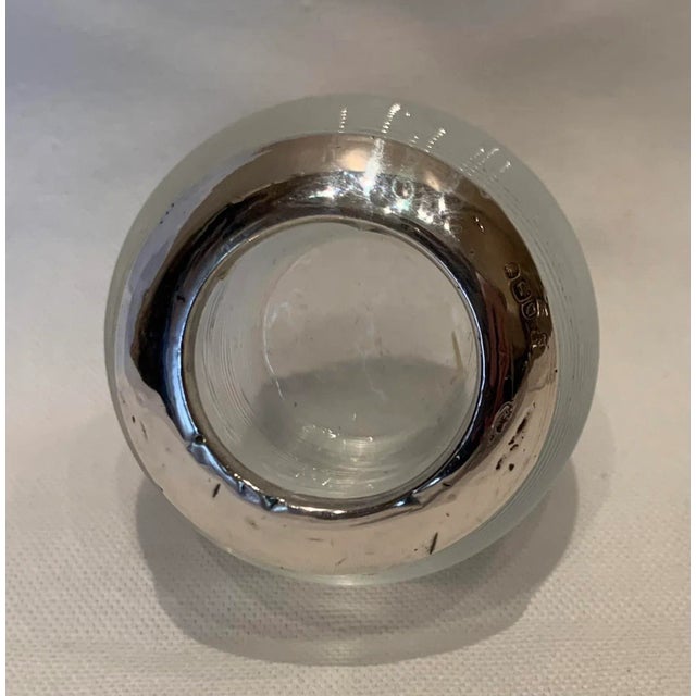 Turn-of-the-century British glass match striker with silver top. Purchased in London in the late 1980s.