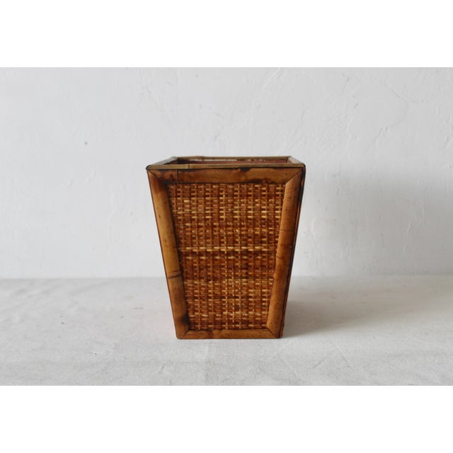 Burnt "Tortoise" Shell Bamboo Woven Wicker Wastebasket. In good vintage condition with minor wear and patina.
