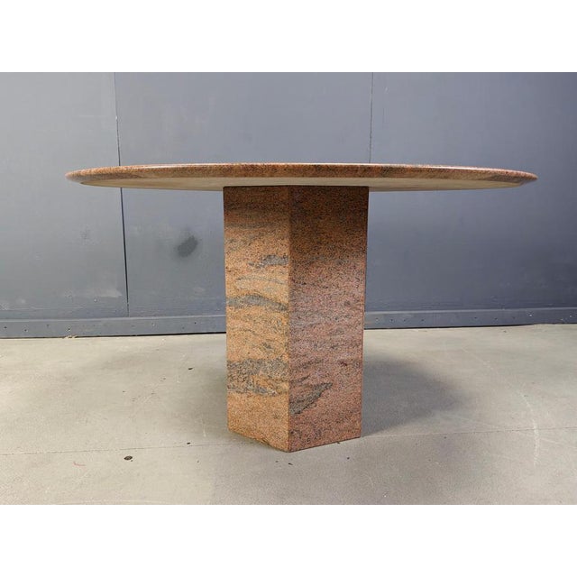 Vintage granite dining table Beautiful round table top resting on an octogonal base. Good condition. 1970s - Belgium...