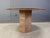 Vintage granite dining table Beautiful round table top resting on an octogonal base. Good condition. 1970s - Belgium...