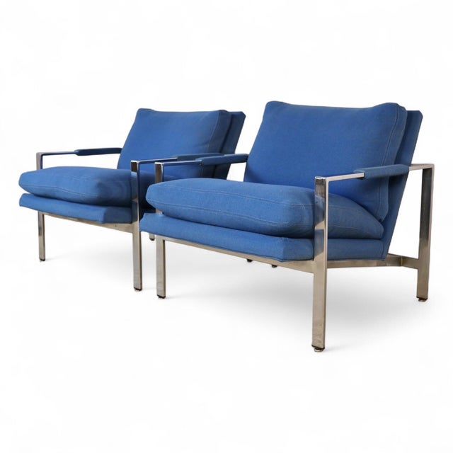 This authentic pair of Milo Baughman lounge chairs for Thayer Coggin showcases the designer's signature flat-bar chrome...