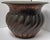 Hand-forged copper planter with hammered texture and repousse fluted design. Warm patina adds timeless charm. Perfect...