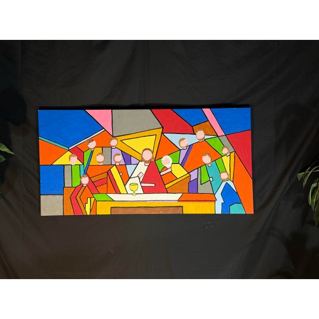 A large colorful geometric abstract canvas artwork featuring a bold cubist-style group scene with strong black linework...