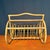 Elegant&nbsp;antique bent rattan and cane magazine rack with a beautifully crafted open framework, graceful curved lines...