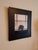 This oil on board painting presents a meticulously rendered skull, positioned against a softly diffused background of...