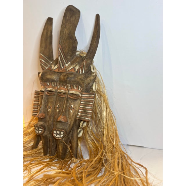 Late 19th Century West African Double-Faced Carved Wood Mask With Raffia and Cowrie Shells For Sale - Image 11 of 11