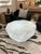 A true statement piece, this sculptural coffee table is hand-carved from natural white onyx in a striking diamond shape....