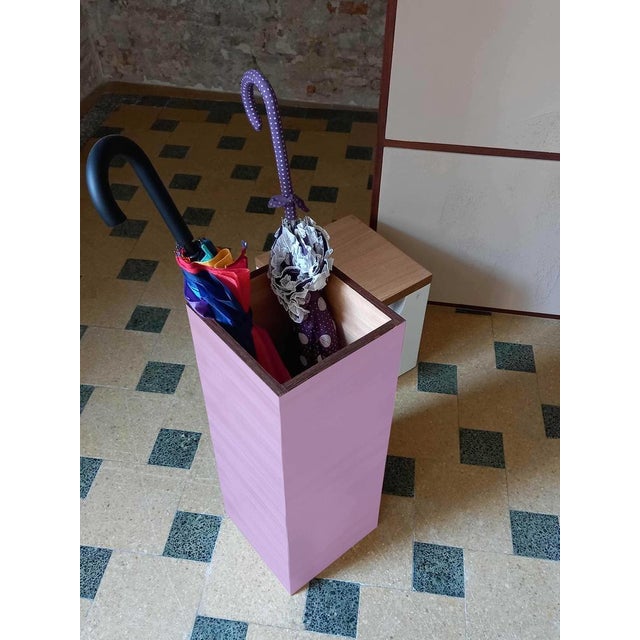 "Plinto Violetto" umbrella stand by Pietro Meccani for Meccani Design. A stunning design piece crafted from light walnut...