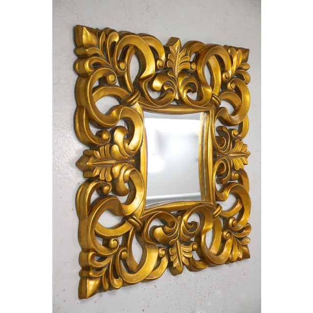 Absolutely unusual 20th century gilt Florentine mirror from the period around 1970 in Italy. This remarkable Italian...