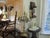 The product is a large antique brass candelabra lamp with six light bulbs, art nouveau crystal prisms with angel wings....
