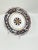 This black and dark red Full Design Salad Plate from Biordi features the figure of a sitting deer. This classic and...