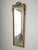 A late 20th century French Louis XVI style dressing mirror by Carolina Mirror Company. The mirror has a beautifully carved...