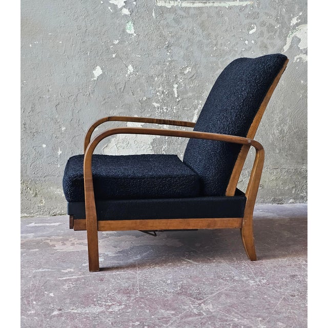 Unique and rare "la riposante brevetto" reclining armchair dating back to the art deco period. recently replaced black...